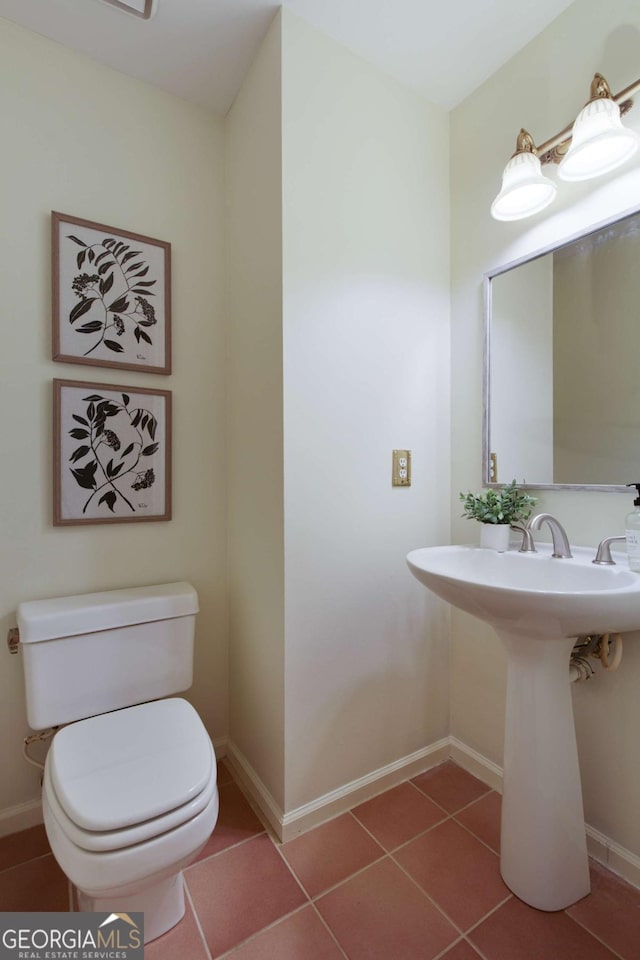 3711 Spinnaker Cir, Alpharetta, GA 30005 - half bath with tile patterned flooring, toilet, and baseboards