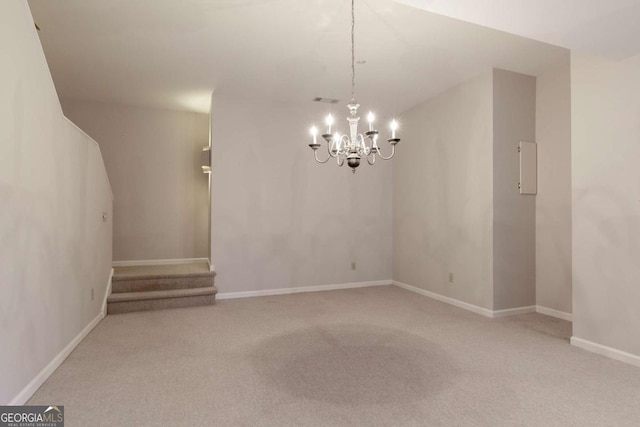 3711 Spinnaker Cir, Alpharetta, GA 30005 - unfurnished dining area featuring carpet floors, a chandelier, baseboards, and stairway