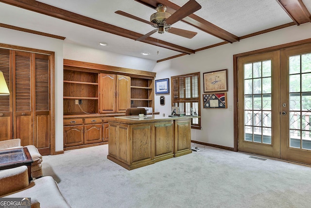 home office with beamed ceiling, french doors, and visible vents