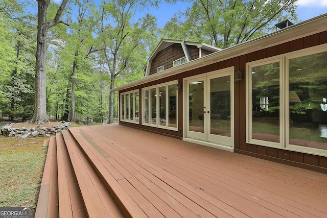 wooden terrace featuring french doors