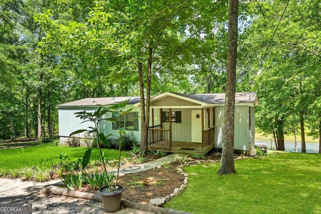 188 Paramount Dr, Eatonton, GA 31024 - view of front facade with a front yard