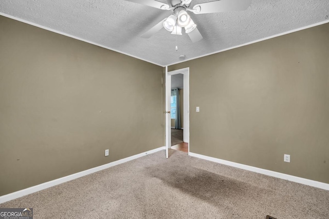 188 Paramount Dr, Eatonton, GA 31024 - carpeted empty room featuring ceiling fan, baseboards, and a textured ceiling