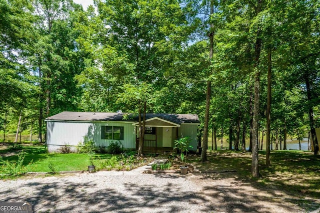 188 Paramount Dr, Eatonton, GA 31024 - view of front facade featuring a front yard
