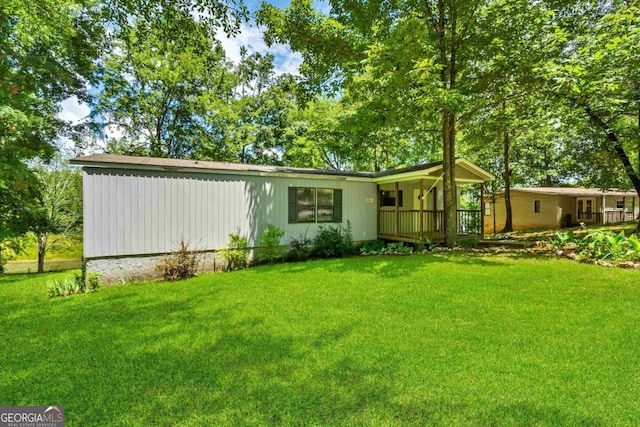 188 Paramount Dr, Eatonton, GA 31024 - exterior space with a yard