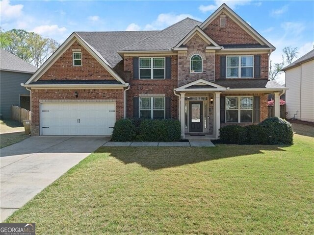 4735 Belcrest Way, Cumming, GA 30040 - view of front of property featuring concrete driveway, brick siding, and a front lawn