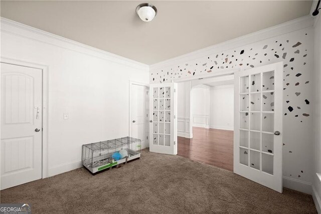 4735 Belcrest Way, Cumming, GA 30040 - interior space featuring arched walkways, french doors, and ornamental molding