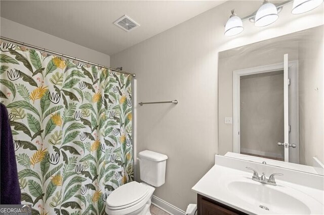 4735 Belcrest Way, Cumming, GA 30040 - bathroom featuring vanity, a shower with curtain, visible vents, toilet, and baseboards