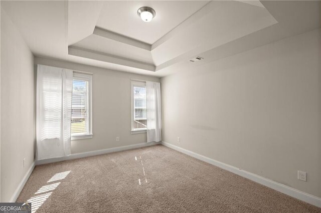 4735 Belcrest Way, Cumming, GA 30040 - unfurnished room with carpet floors, visible vents, baseboards, and a raised ceiling