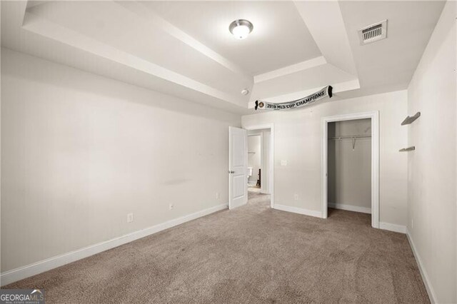 4735 Belcrest Way, Cumming, GA 30040 - unfurnished bedroom with a closet, baseboards, carpet flooring, visible vents, and a raised ceiling
