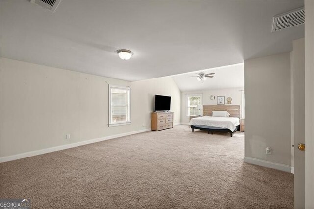 4735 Belcrest Way, Cumming, GA 30040 - unfurnished bedroom with visible vents, baseboards, carpet flooring, and vaulted ceiling