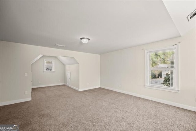 4735 Belcrest Way, Cumming, GA 30040 - bonus room featuring visible vents, baseboards, vaulted ceiling, and carpet