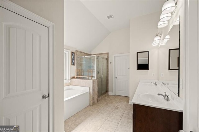 4735 Belcrest Way, Cumming, GA 30040 - full bathroom featuring a sink, a shower stall, double vanity, a garden tub, and lofted ceiling