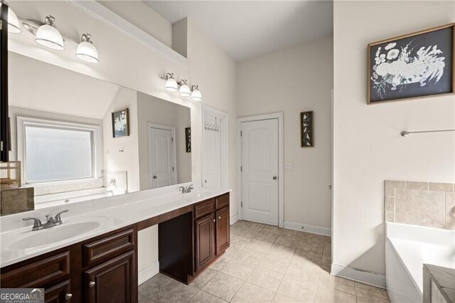 4735 Belcrest Way, Cumming, GA 30040 - bathroom with a sink, a bath, double vanity, and tile patterned flooring