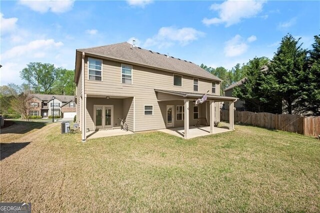 4735 Belcrest Way, Cumming, GA 30040 - rear view of house with central AC, a yard, a patio area, fence, and french doors