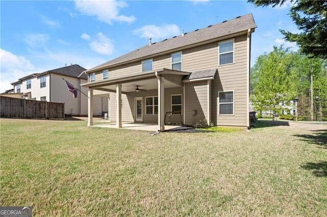 4735 Belcrest Way, Cumming, GA 30040 - rear view of house with a patio, fence, a ceiling fan, and a lawn