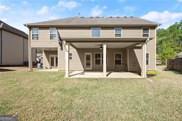 4735 Belcrest Way, Cumming, GA 30040 - rear view of property with a patio and a yard