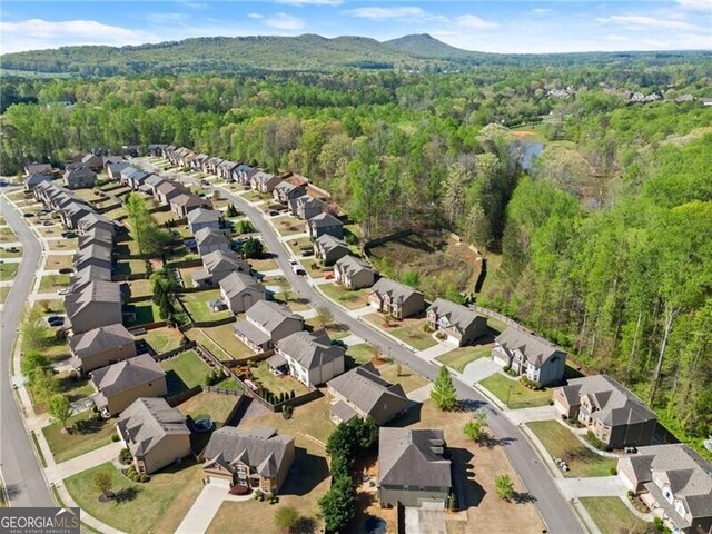 4735 Belcrest Way, Cumming, GA 30040 - birds eye view of property with a wooded view and a residential view