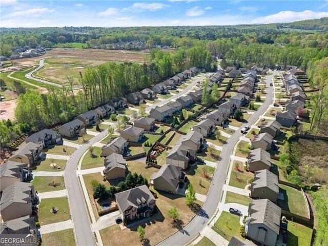 4735 Belcrest Way, Cumming, GA 30040 - drone / aerial view featuring a forest view and a residential view