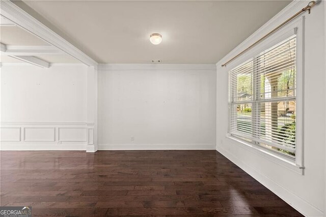 4735 Belcrest Way, Cumming, GA 30040 - empty room featuring a decorative wall, baseboards, and dark wood-style floors