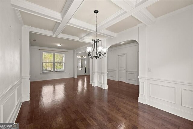4735 Belcrest Way, Cumming, GA 30040 - unfurnished dining area with arched walkways, a decorative wall, a notable chandelier, and beam ceiling