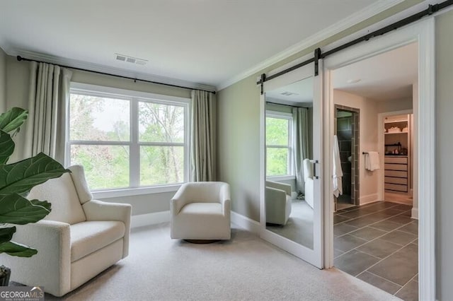 412 Nickajack Retreat Ln, Smyrna, GA 30082 - living area featuring visible vents, baseboards, ornamental molding, and a barn door