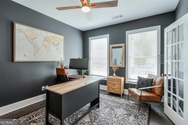 412 Nickajack Retreat Ln, Smyrna, GA 30082 - home office with ceiling fan, baseboards, wood finished floors, and visible vents