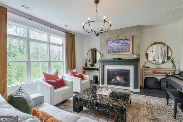 412 Nickajack Retreat Ln, Smyrna, GA 30082 - living area with a notable chandelier, crown molding, visible vents, and plenty of natural light