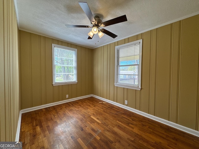 86 Empire St, Yatesville, GA 31097 - empty room with crown molding, baseboards, and wood finished floors