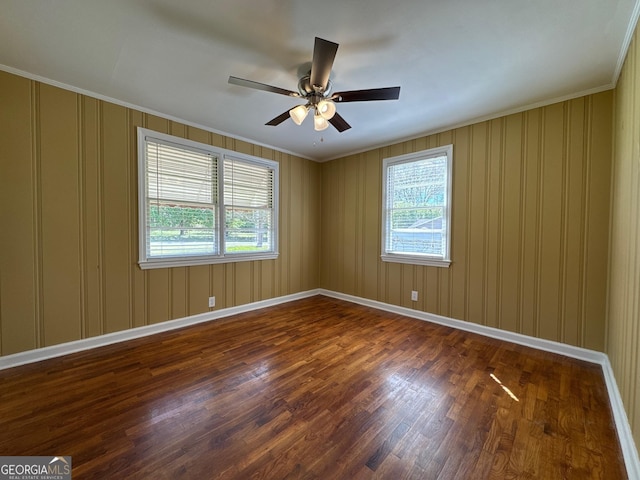 86 Empire St, Yatesville, GA 31097 - unfurnished room featuring crown molding, wood finished floors, baseboards, and a ceiling fan