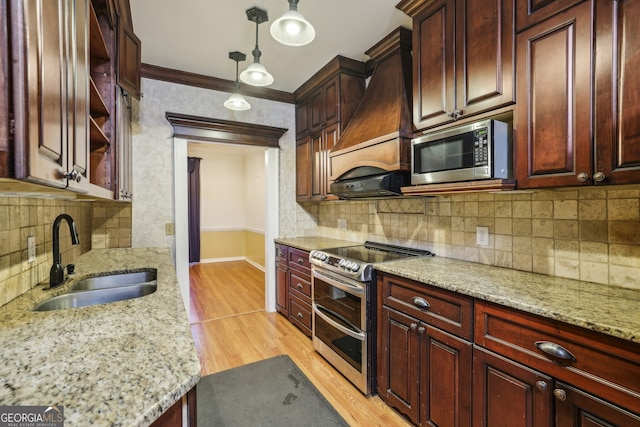 45 Willow Gln NE, Atlanta, GA 30342 - kitchen featuring custom range hood, light wood-type flooring, ornamental molding, stainless steel appliances, and a sink