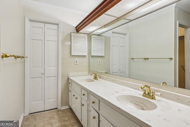45 Willow Gln NE, Atlanta, GA 30342 - bathroom featuring a closet, double vanity, and a sink