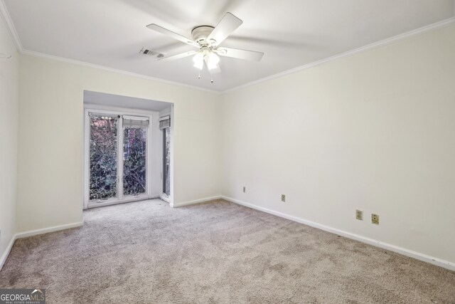 45 Willow Gln NE, Atlanta, GA 30342 - empty room featuring visible vents, baseboards, ornamental molding, ceiling fan, and carpet floors