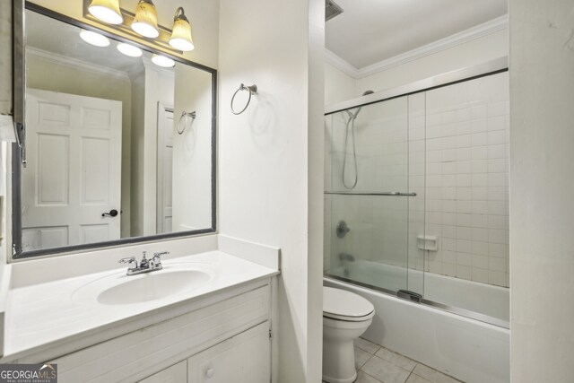 45 Willow Gln NE, Atlanta, GA 30342 - bathroom with vanity, enclosed tub / shower combo, tile patterned floors, crown molding, and toilet