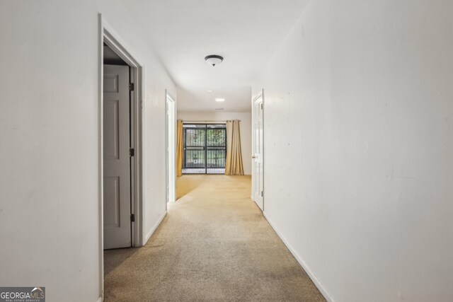 45 Willow Gln NE, Atlanta, GA 30342 - corridor featuring baseboards and light carpet