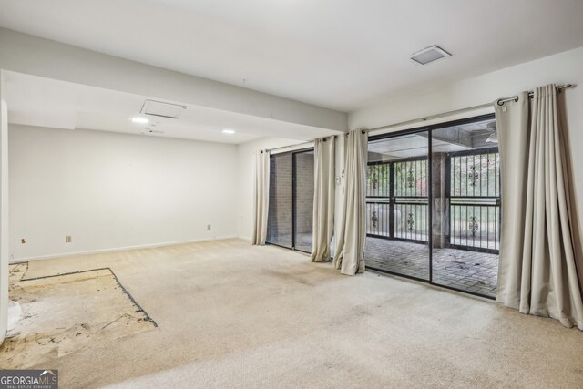 45 Willow Gln NE, Atlanta, GA 30342 - carpeted empty room featuring baseboards