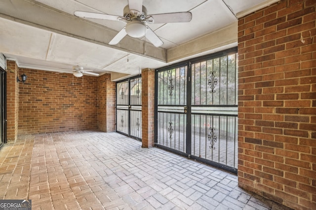 45 Willow Gln NE, Atlanta, GA 30342 - unfurnished sunroom with plenty of natural light and ceiling fan