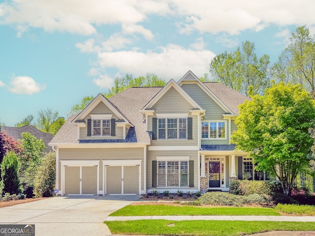 4106 Creekview Ridge Dr NE, Buford, GA 30518 - view of front of home featuring an attached garage and concrete driveway