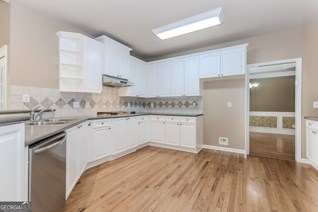 4106 Creekview Ridge Dr NE, Buford, GA 30518 - unfurnished dining area with an inviting chandelier, ornamental molding, stairs, and a raised ceiling