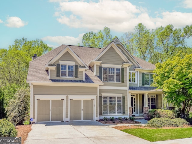 4106 Creekview Ridge Dr NE, Buford, GA 30518 - craftsman-style home featuring a shingled roof, driveway, and a garage