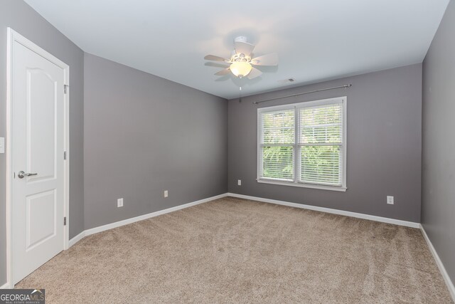 4106 Creekview Ridge Dr NE, Buford, GA 30518 - carpeted spare room with ceiling fan and baseboards