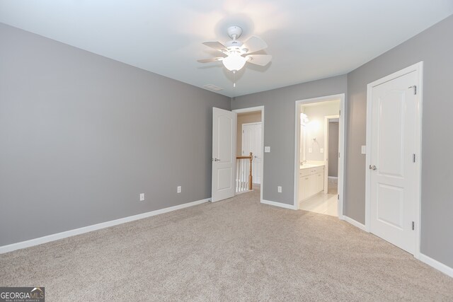 4106 Creekview Ridge Dr NE, Buford, GA 30518 - unfurnished bedroom with visible vents, baseboards, light colored carpet, a ceiling fan, and ensuite bath