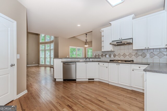 4106 Creekview Ridge Dr NE, Buford, GA 30518 - unfurnished living room with crown molding, stairs, carpet, a notable chandelier, and visible vents