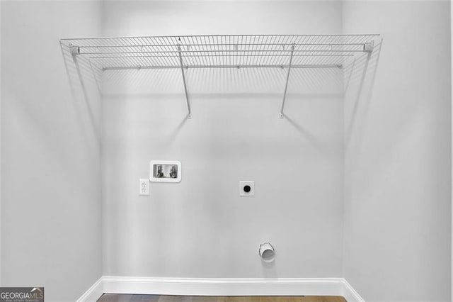 5719 Calm Valley Pt, Flowery Branch, GA 30542 - washroom with electric dryer hookup, hookup for a washing machine, and wood finished floors