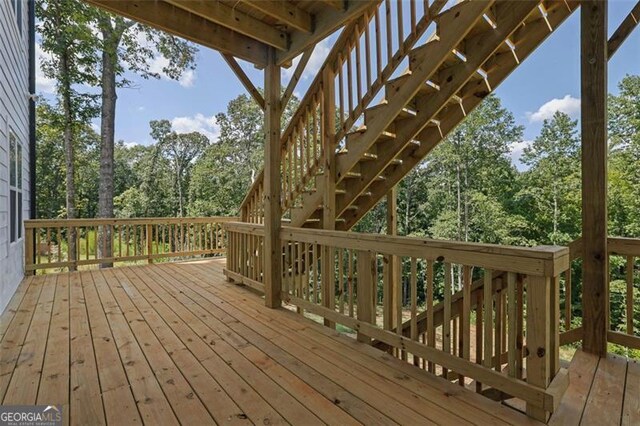 5719 Calm Valley Pt, Flowery Branch, GA 30542 - wooden terrace with stairs