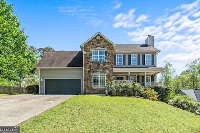 2515 Harbins Mill Dr, Dacula, GA 30019 - traditional-style house featuring stone siding, concrete driveway, a chimney, an attached garage, and a porch
