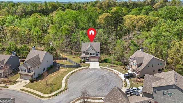 bird's eye view with a residential view and a forest view