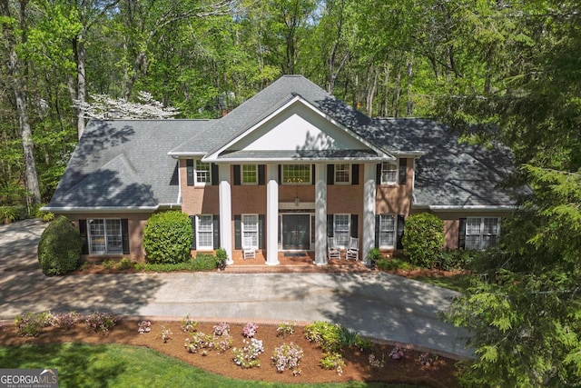 2000 Old Dominion Rd, Atlanta, GA 30350 - neoclassical home featuring a shingled roof