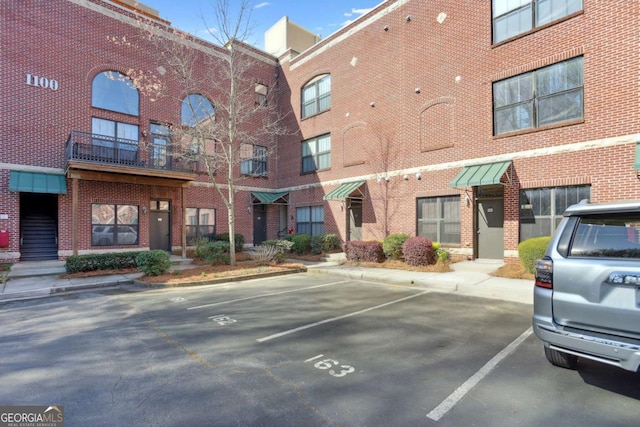 791 Wylie St SE Unit 1111, Atlanta, GA 30316 - view of building exterior featuring uncovered parking