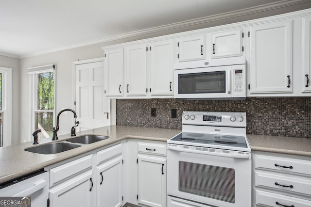 4284 Windy Gap Ct NW, Kennesaw, GA 30144 - kitchen featuring white appliances, white cabinetry, ornamental molding, a sink, and decorative backsplash