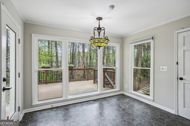 4284 Windy Gap Ct NW, Kennesaw, GA 30144 - unfurnished sunroom with crown molding, baseboards, and stone finish floor